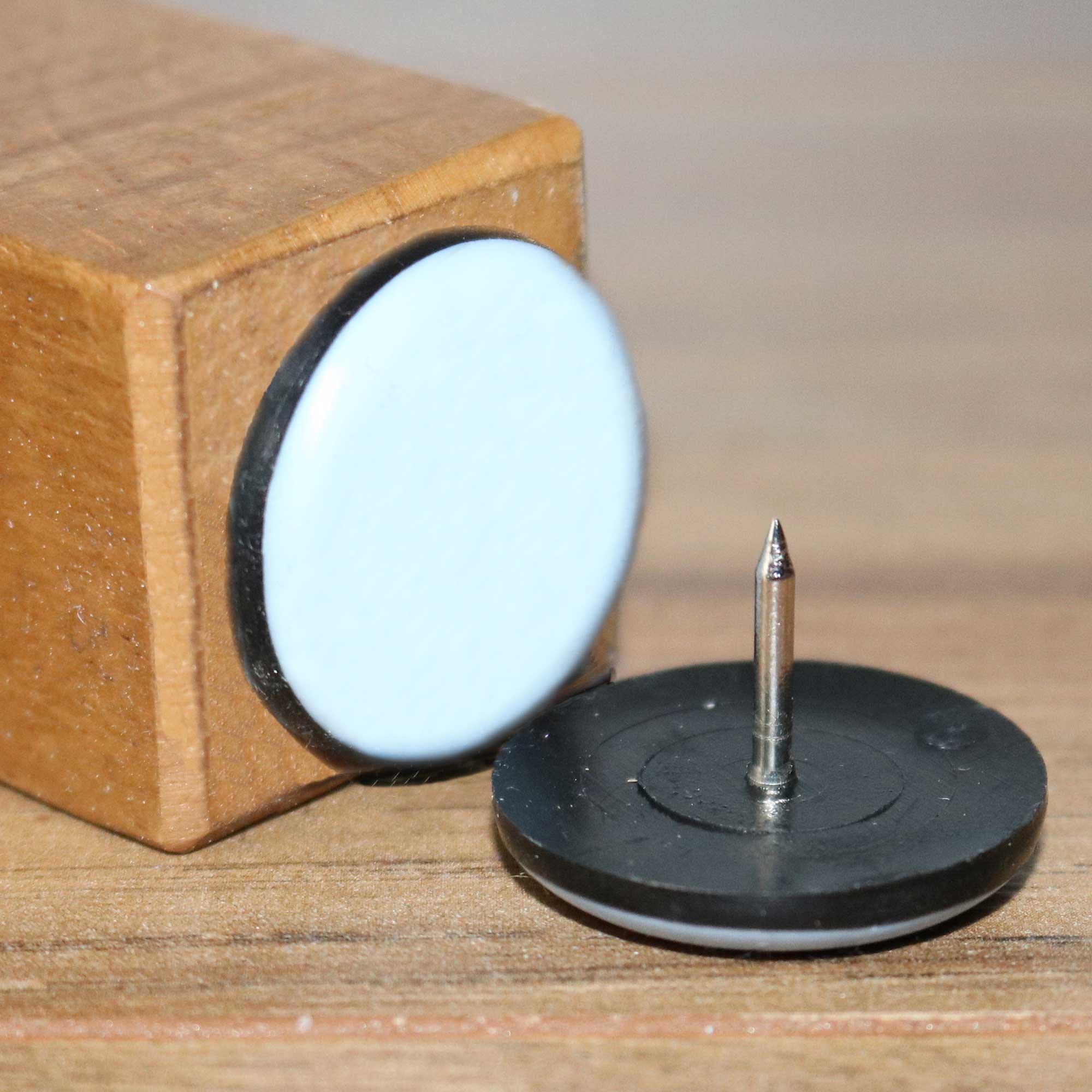 An example of tap to fit, nail on furniture feet